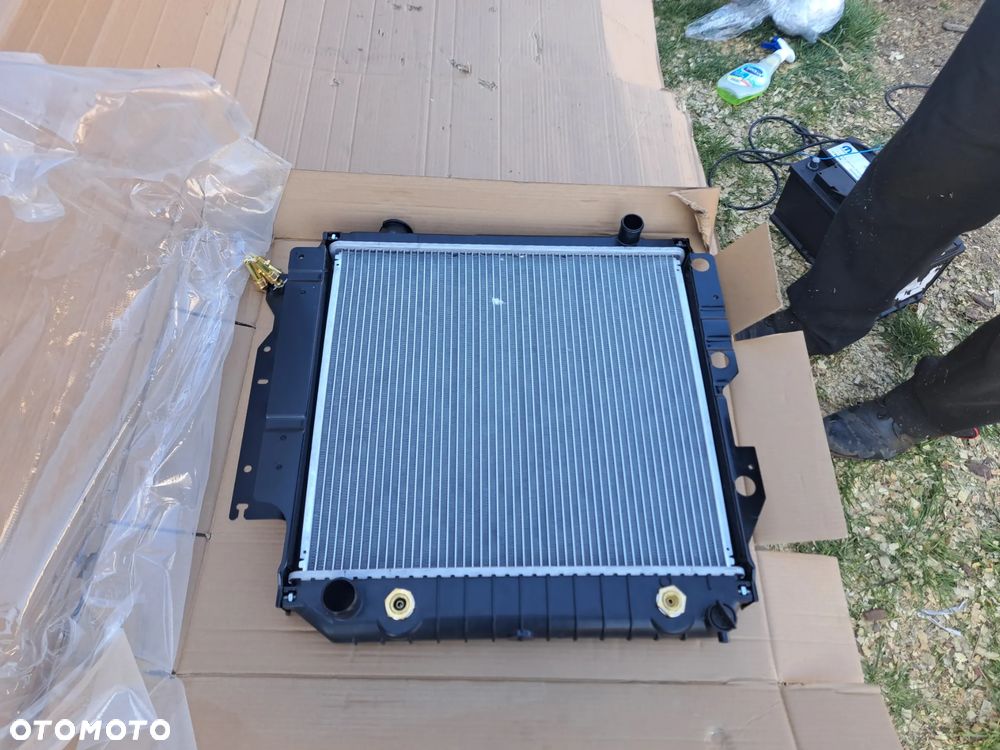 Chłodnica wody Jeep Wrangler YJ TJ 4.0 52040286 52007227 - 3
