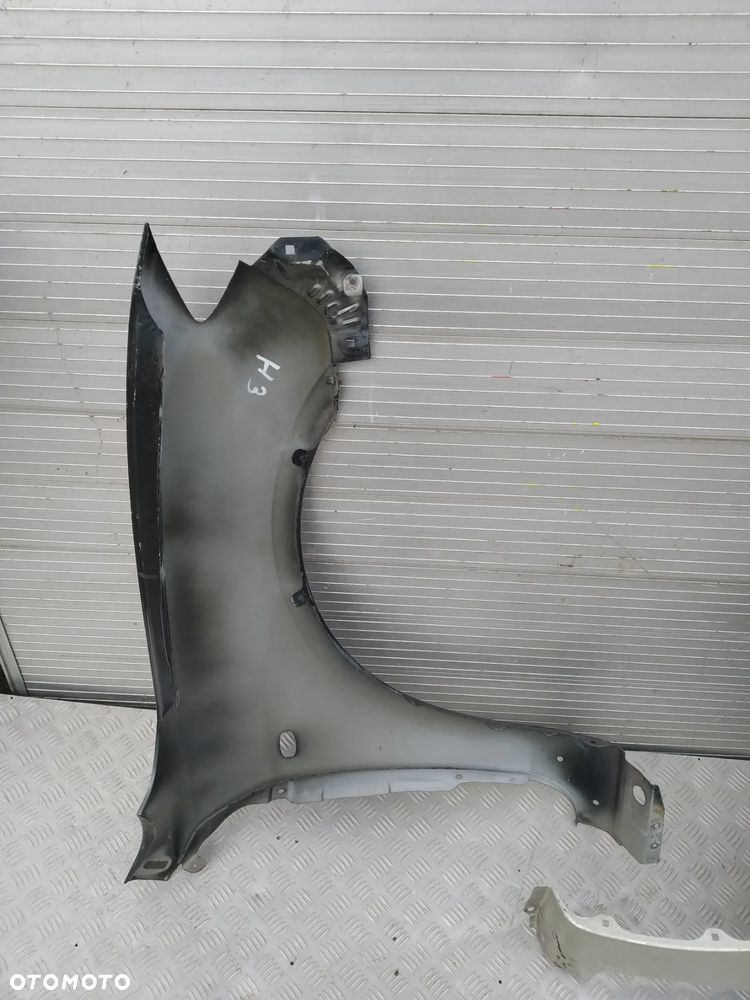 E763/F770/H3/H126/H131/H437/H438/H604 LEWY BŁOTNIK MAZDA 3 SEDAN - 5