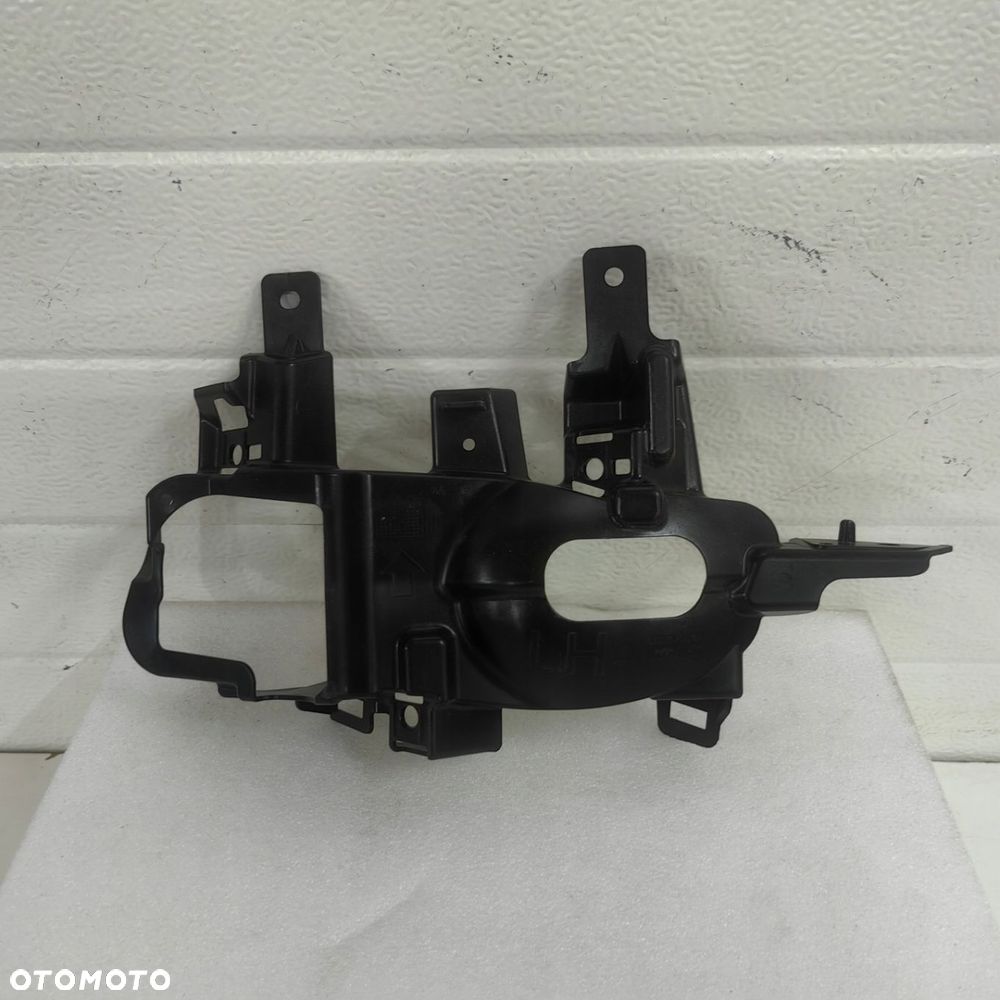 Mocowanie halogenu lewe Nissan Qashqai j11 lift 26915-HV01A - 1