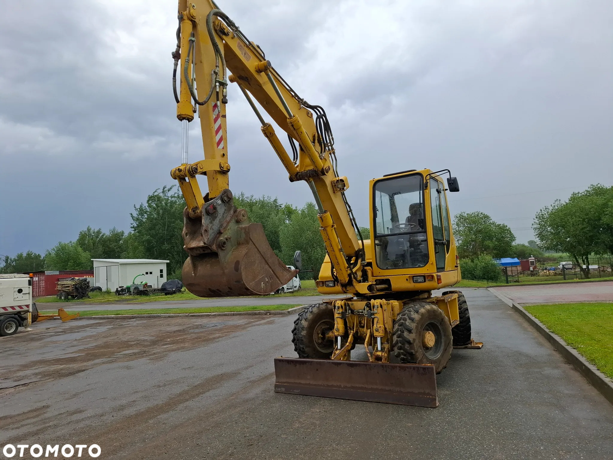 Komatsu PW75 - 11