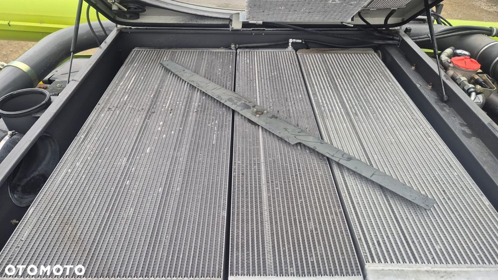 Claas Lexion 780TT z hederem - 6