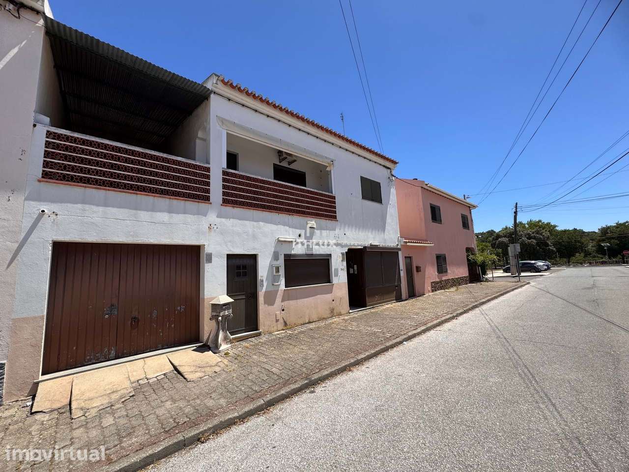 Edifício misto para habitação e comércio, com vista e espaço generoso - Grande imagem: 3/36