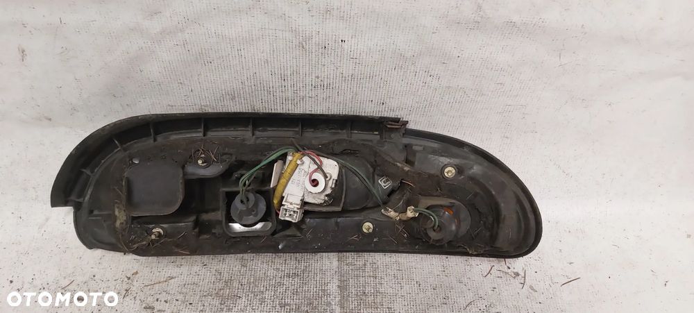 .  PRZOD PRZEDNIA LAMPA LEWA NISSAN 100 NX - 3