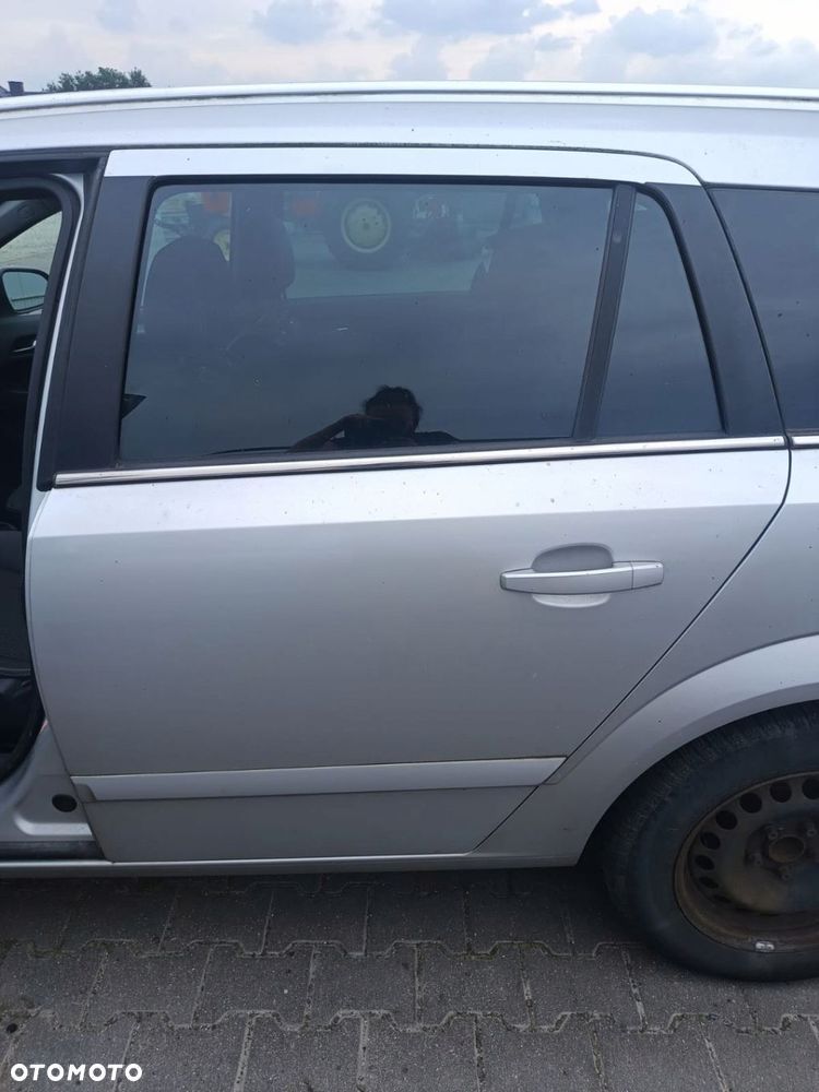 OPEL ASTRA H KOMBI DRZWI LEWE TYLNE Z157 - 1
