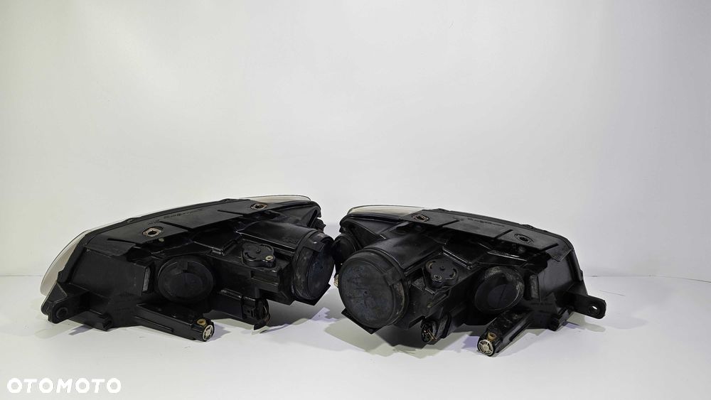 VW Passat B6 Lampy Przód Przednie Komplet Lewa + Prawa Europa Oryginał Valeo Stan BDB - 11