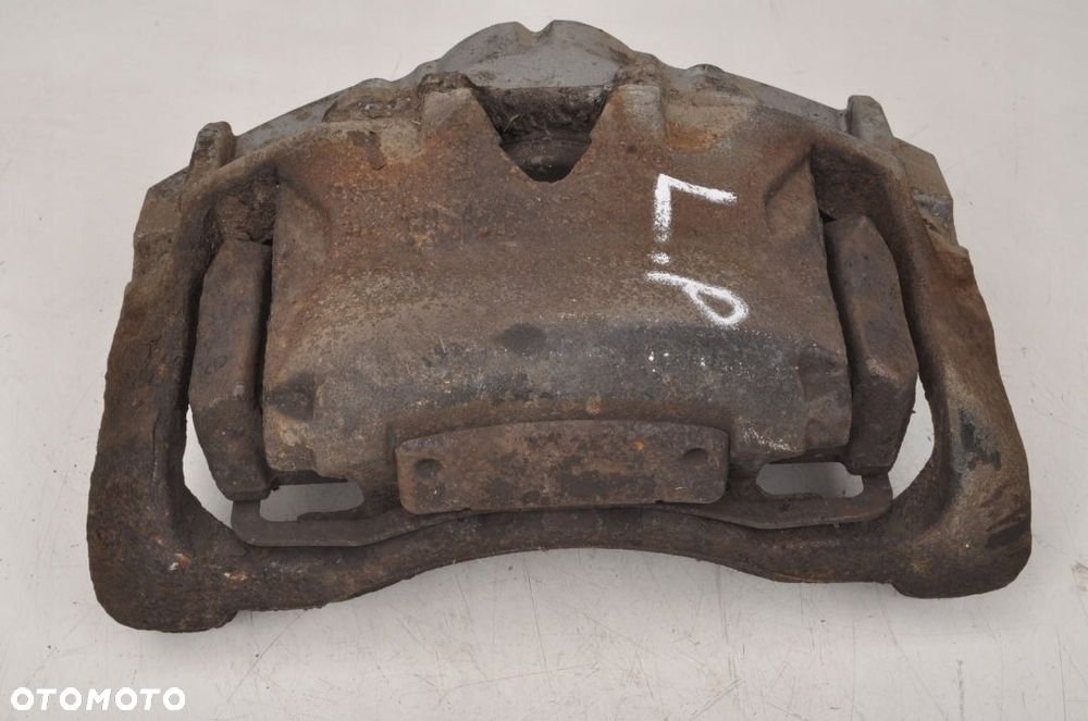 VOLVO S60 II V60 2.4 D4 ZACISK LEWY PRZÓD 945