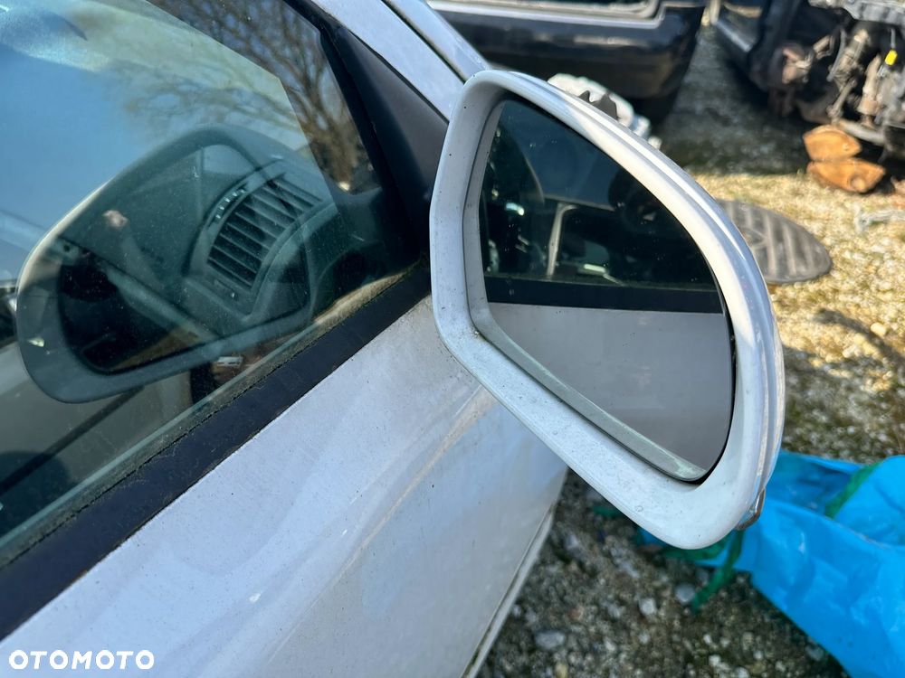 OCTAVIA II LIFT LUSTERKO LEWE PRAWE - 4