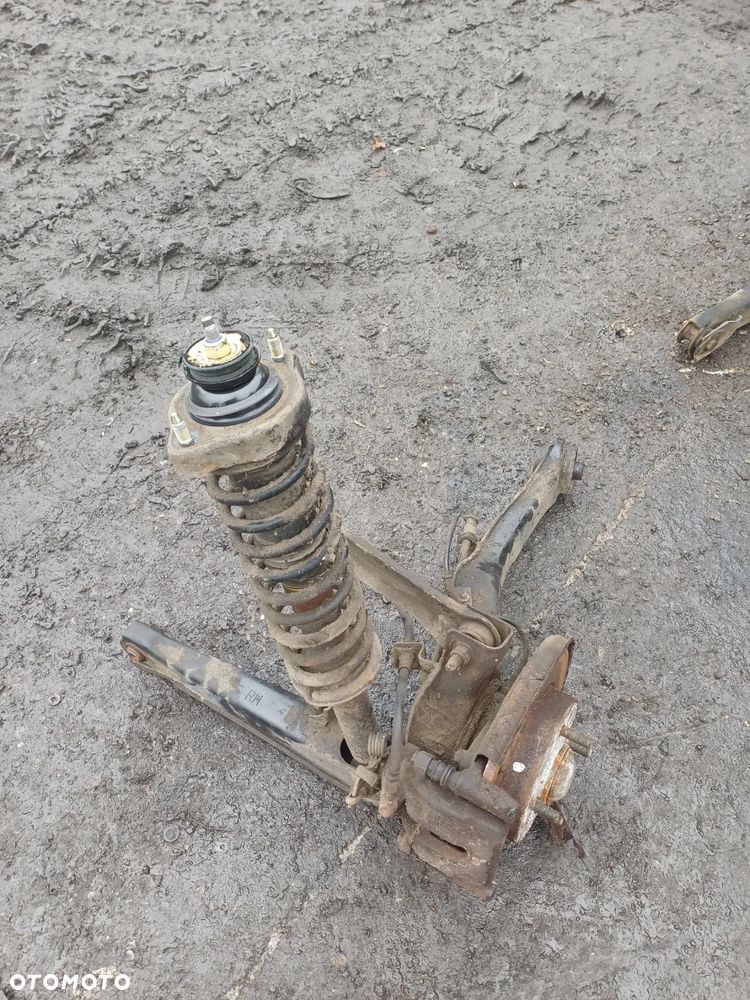 Wahacz tylny lewy prawy 1.8 gdi Mitsubishi Carisma 2003r lift 4G93 - 4