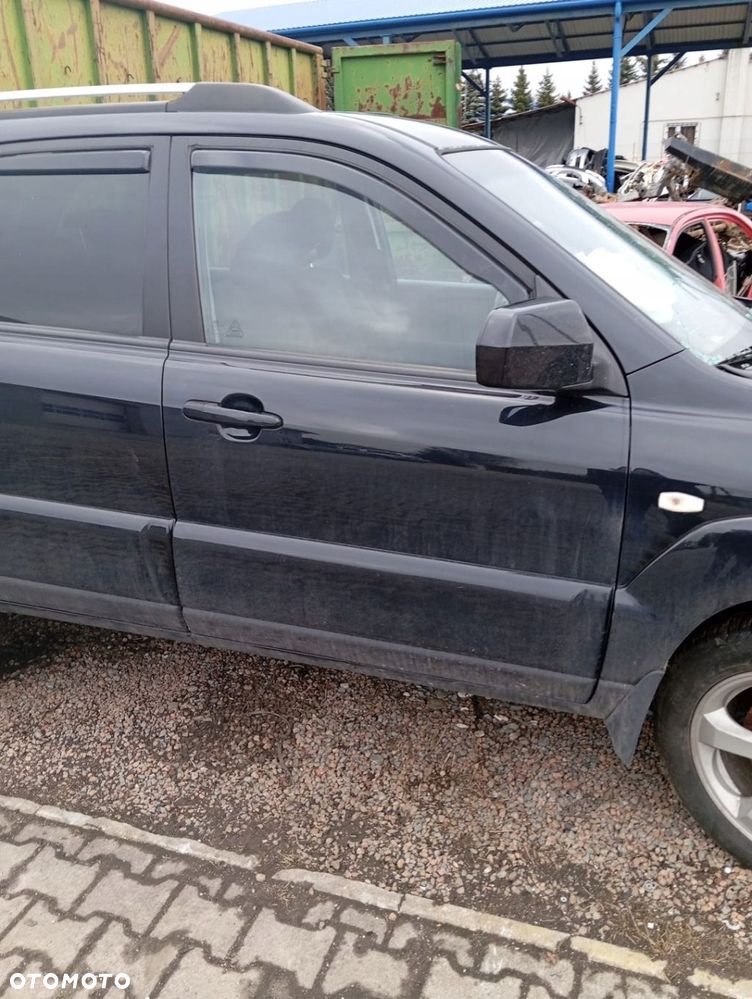 KIA SPORTAGE II LIFT DRZWI PRAWE PRZÓD PRZEDNIE GOŁE 1K