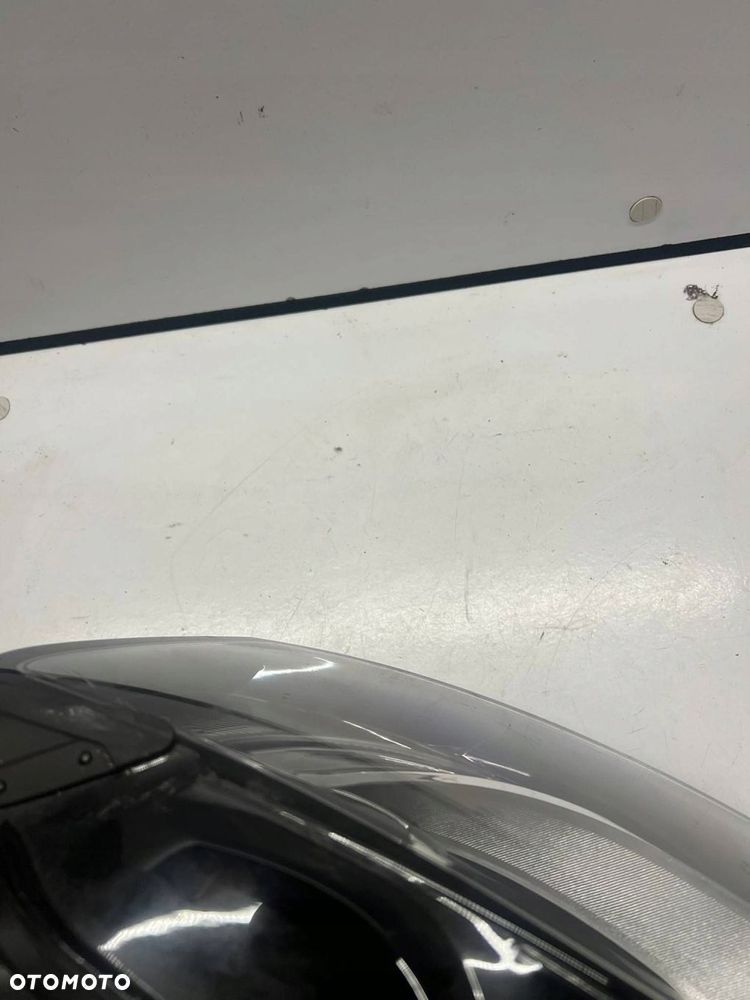 307 023 427 Reflektor Audi A6 S6 C6 4F PRZÓD LEWY - 15