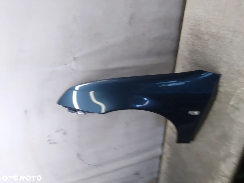 ! BŁOTNIK LEWY PRZEDNI DO SAAB 93 PRZEDLIFT 300 - 2