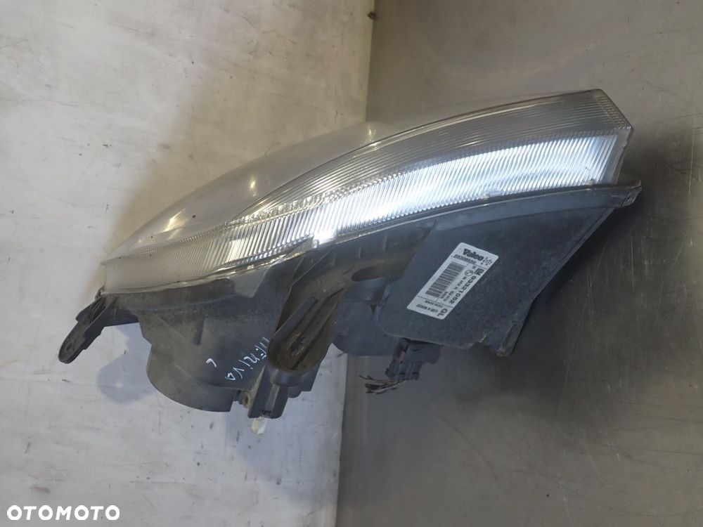 LAMPA LEWA PRZEDNIA OPEL MERIVA A 1.2 93321052 - 2