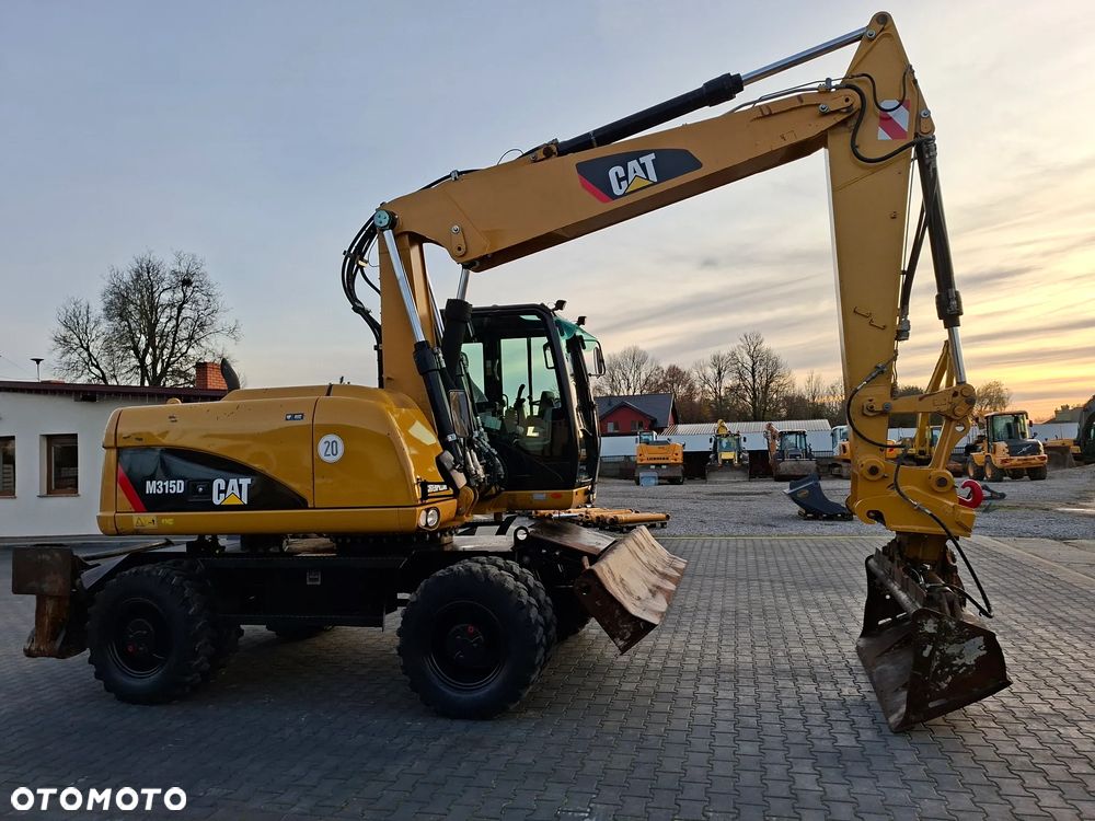 Caterpillar CAT M315D Rok 2011 - 7