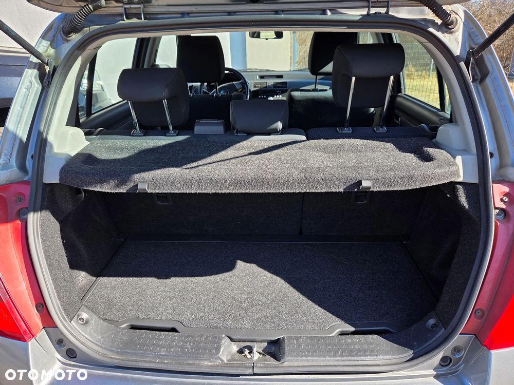 Suzuki Swift 1.3 Club - 9