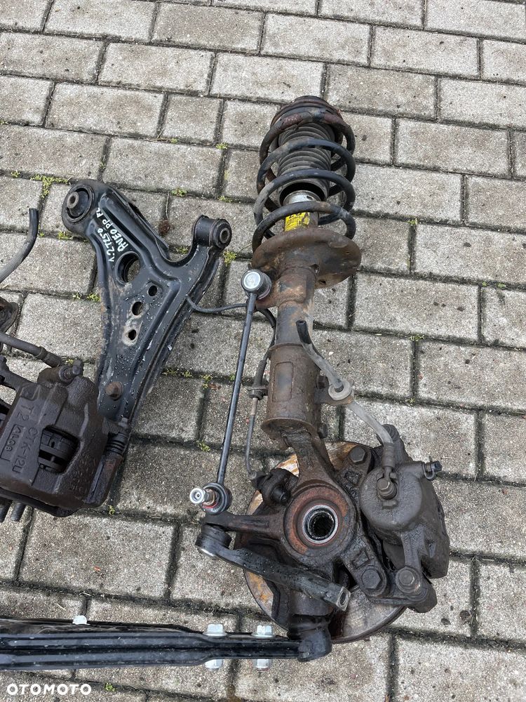 MC Pherson AMORTYZATOR przód PRAWY LEWY ZWROTNICA AVEO 1,2 16V T250 LIFT 07- - 2
