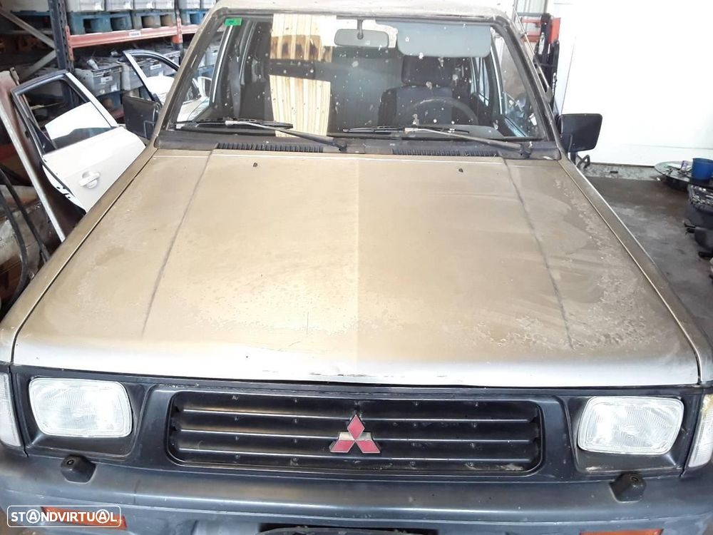 CAPÔ MITSUBISHI L200 K34T - 1