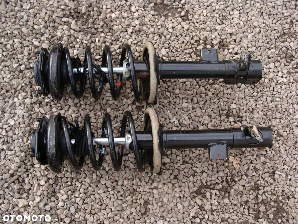 amortyzatory komplet tył nissan x-trail t30 553038h304 553028h304 - 3