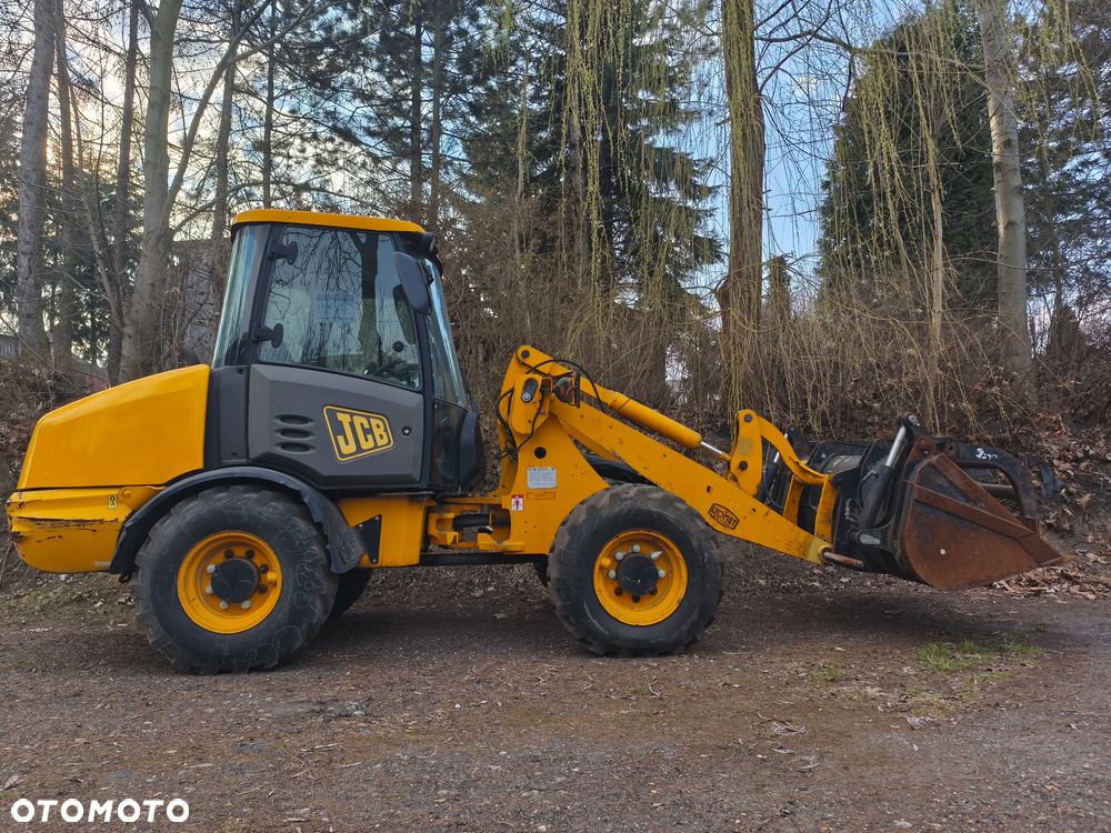 JCB 406 - 2