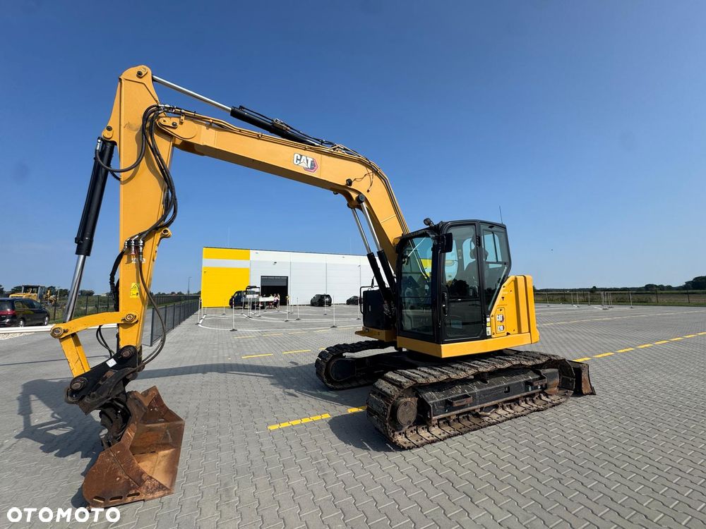 Caterpillar 310 - 4