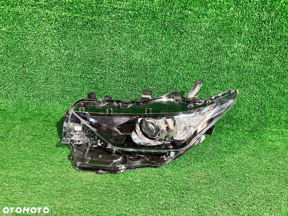 REFLEKTOR LEWY TOYOTA AURIS II LIFT 15-