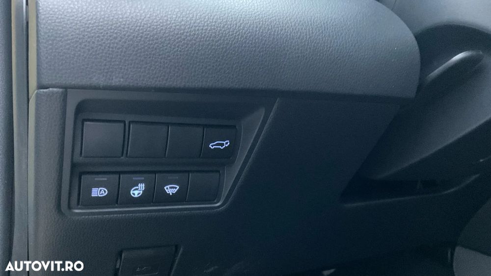 Toyota Yaris Cross 1.5 VVT-i HSD 130 4x4 HEV Exclusive - 35