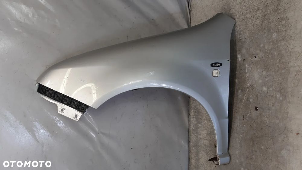 * BŁOTNIK PRZÓD PRZEDNI LEWY DO SKODA FABIA I 9102 SREBRNY - 1