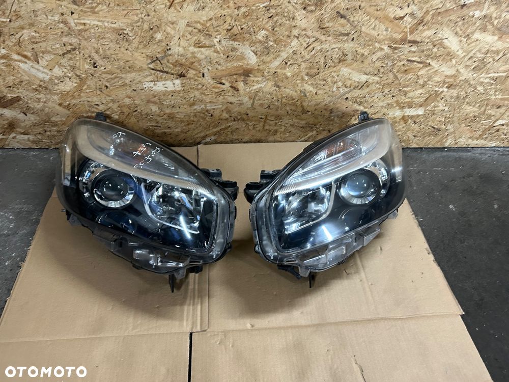 Renault Koleos I lift 2011- lampa lewy przód prawy przód europa soczewka - 1