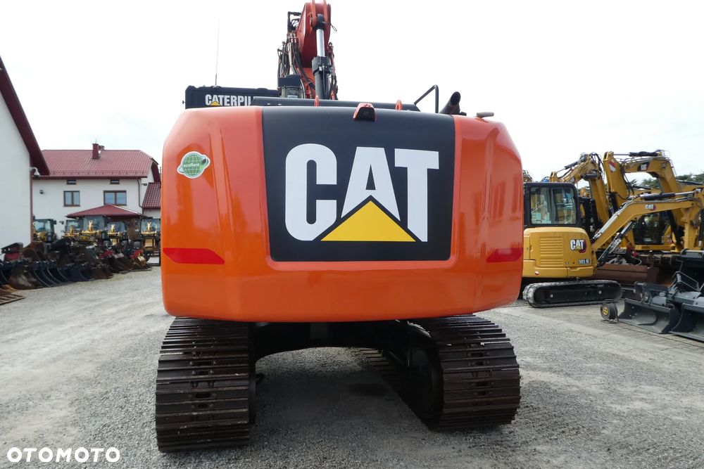 Caterpillar M 318F Z NIEMIEC TRZY ŁYŻKI - 5