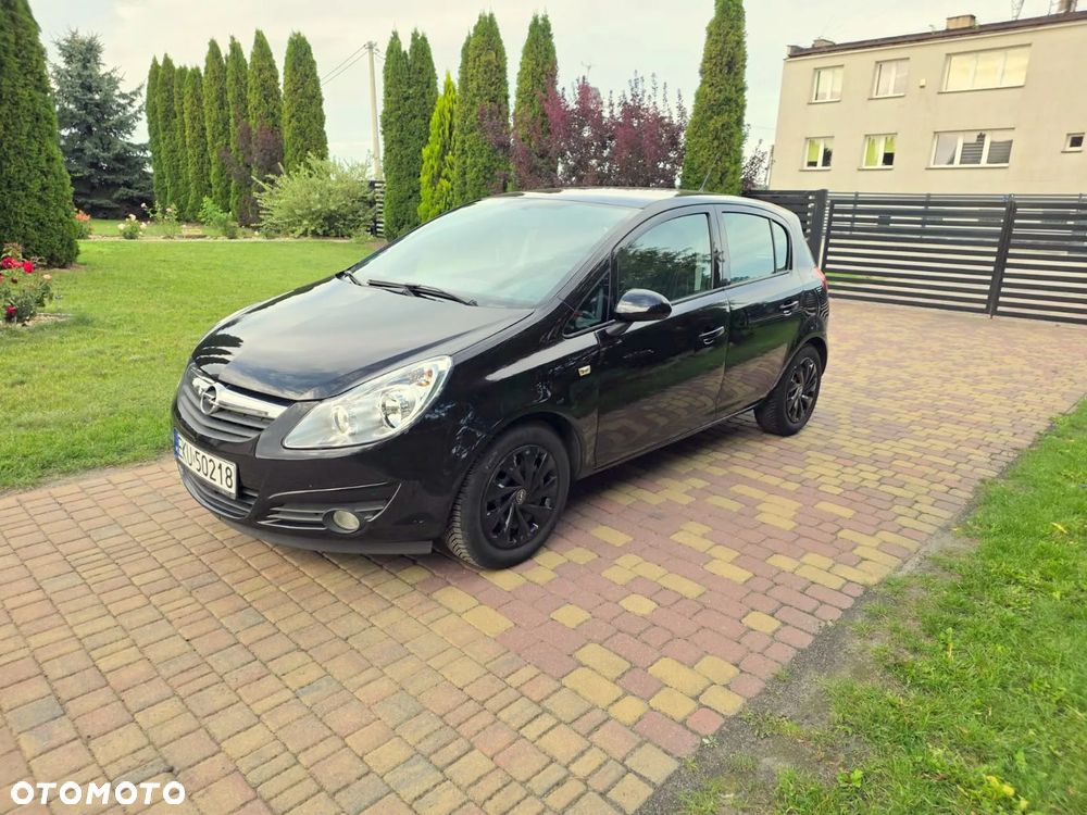 Opel Corsa 1.4 16V Enjoy - 23