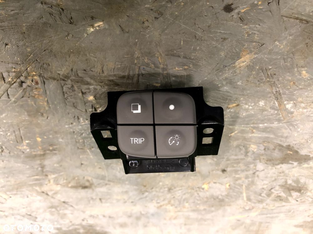 NISSAN E-NV200 LEAF PRZEŁĄCZNIK PRZYCISKI TRIP REGULACJI OŚWIETLENIA PANEL