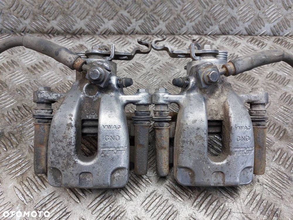 ZACISK HAMULCOWY LEWY TYŁ + PRAWY TYŁ OCTAVIA III - 1