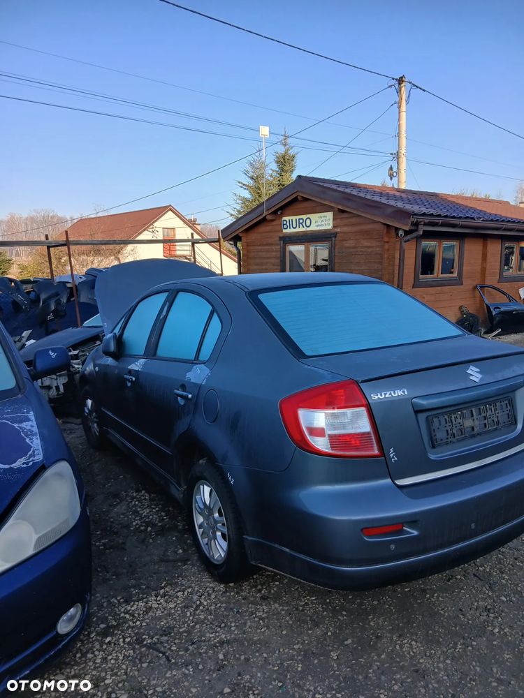 SUZUKI SX4 SEDAN 07- SILNIK SKRZYNIA BIEGÓW maska drzwi zderzak klapa tył LAK ZY4 - 4