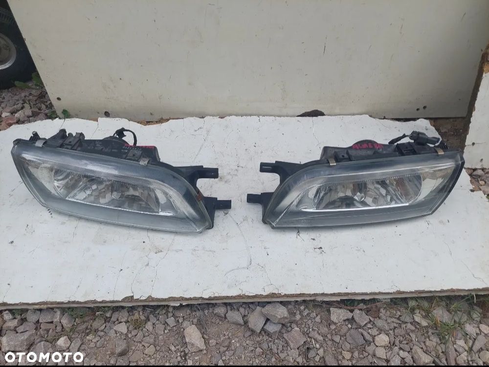 LAMPA REFLEKTOR LEWA PRAWA NISSAN ALMERA N15 - 1