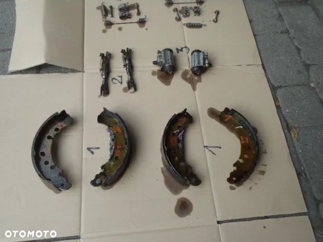 bęben szczęki cylinderek rozpierak hamulec tylny osłona tarcza kotwiczna kostka abs z zawieszenie tył toyota yaris II III 2 3 jak nowe - 28