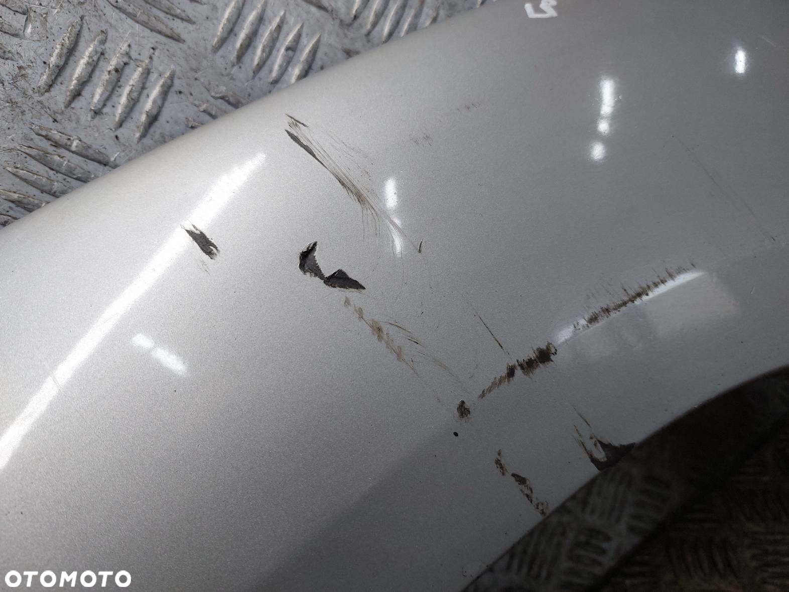 NAKŁADKA BŁOTNIKA LEWY PRZÓD KIA SPORTAGE II S6 87713-1F000 - 2