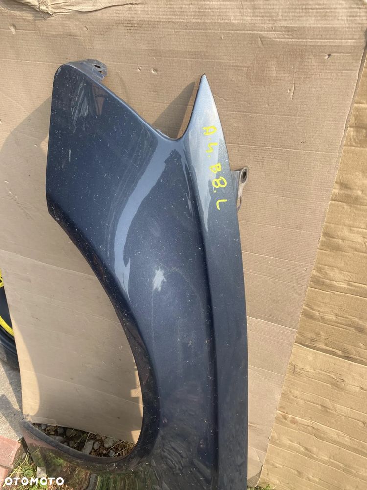 Błotnik Audi A4 B8 lewy - 2