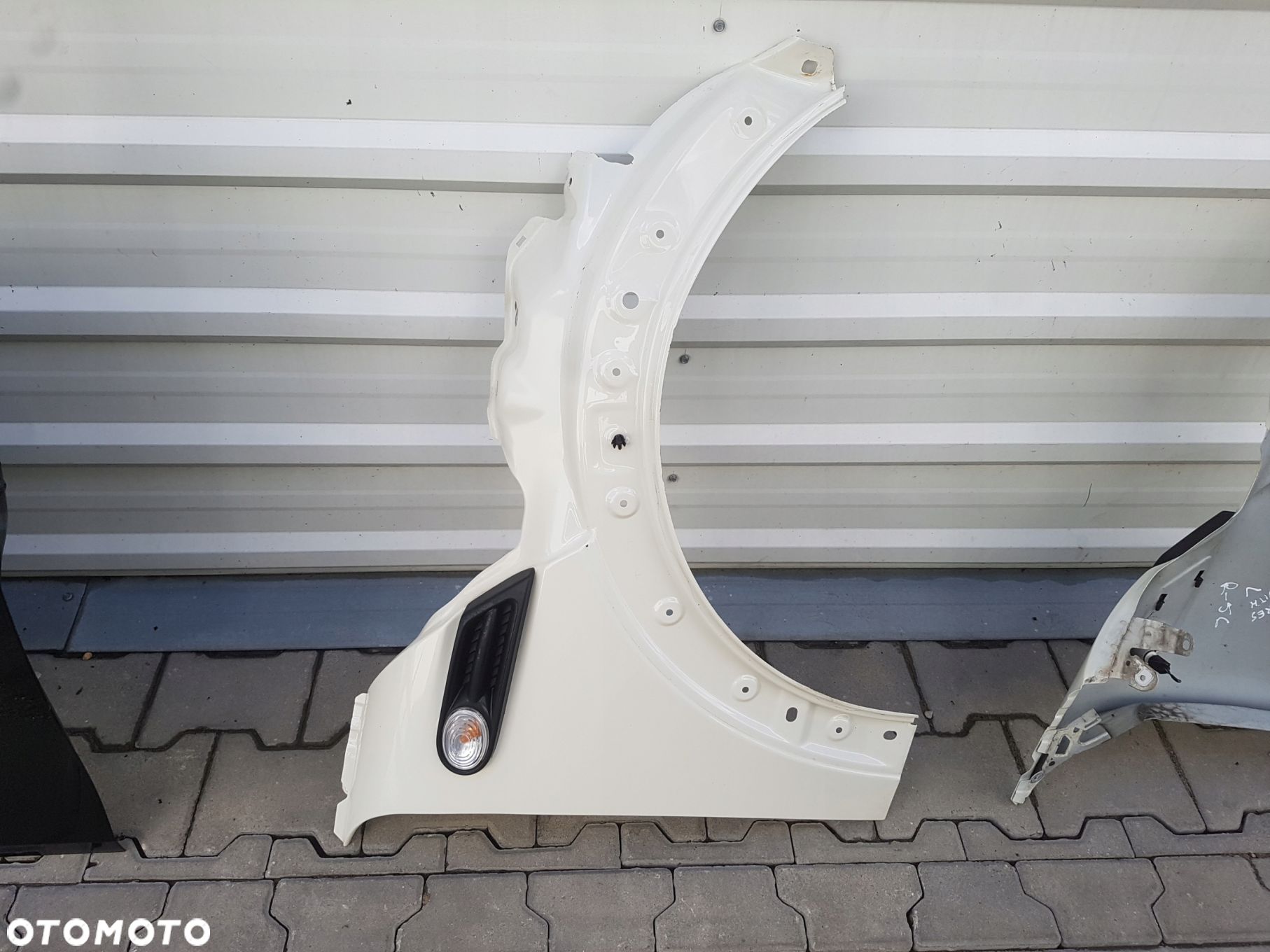 MINI COOPER R56 R55 BŁOTNIK PRAWY PRZÓD 850 - 1