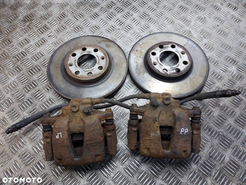 TARCZE HAMULCOWE PRZÓD + KLOCKI + ZACISKI OPEL CORSA D 1.3 CDTI - 1