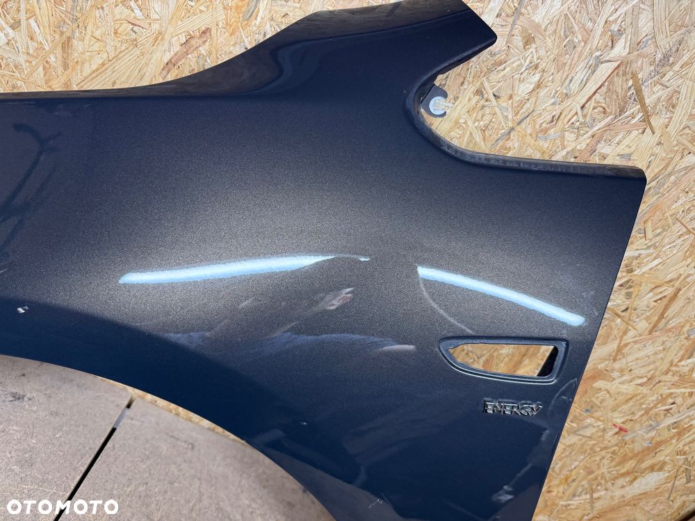 BŁOTNIK LEWY PRZÓD LEWY PRZEDNI OPEL ASTRA IV J - 13