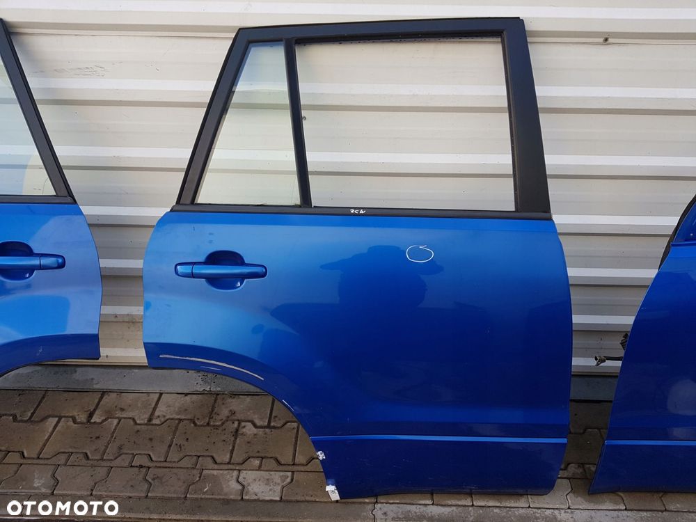 SUZUKI GRAND VITARA 2 II 05-10 DRZWI PRAWE TYŁ ZCW - 1