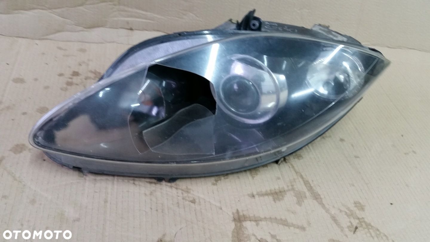 LAMPA LEWA BI- XENON SKRĘTNY SEAT LEON II 1P1941007B EUROPA NA CZĘSCI - 1