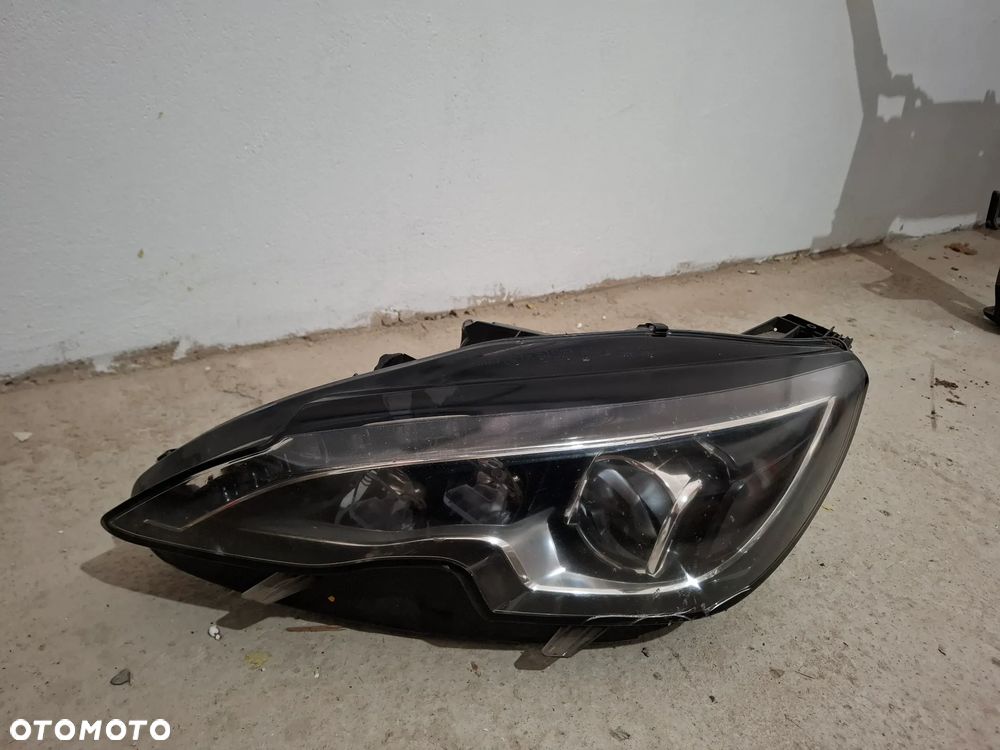Lampa lewa przednia Peugeot 308 T9 030128723103 - 1