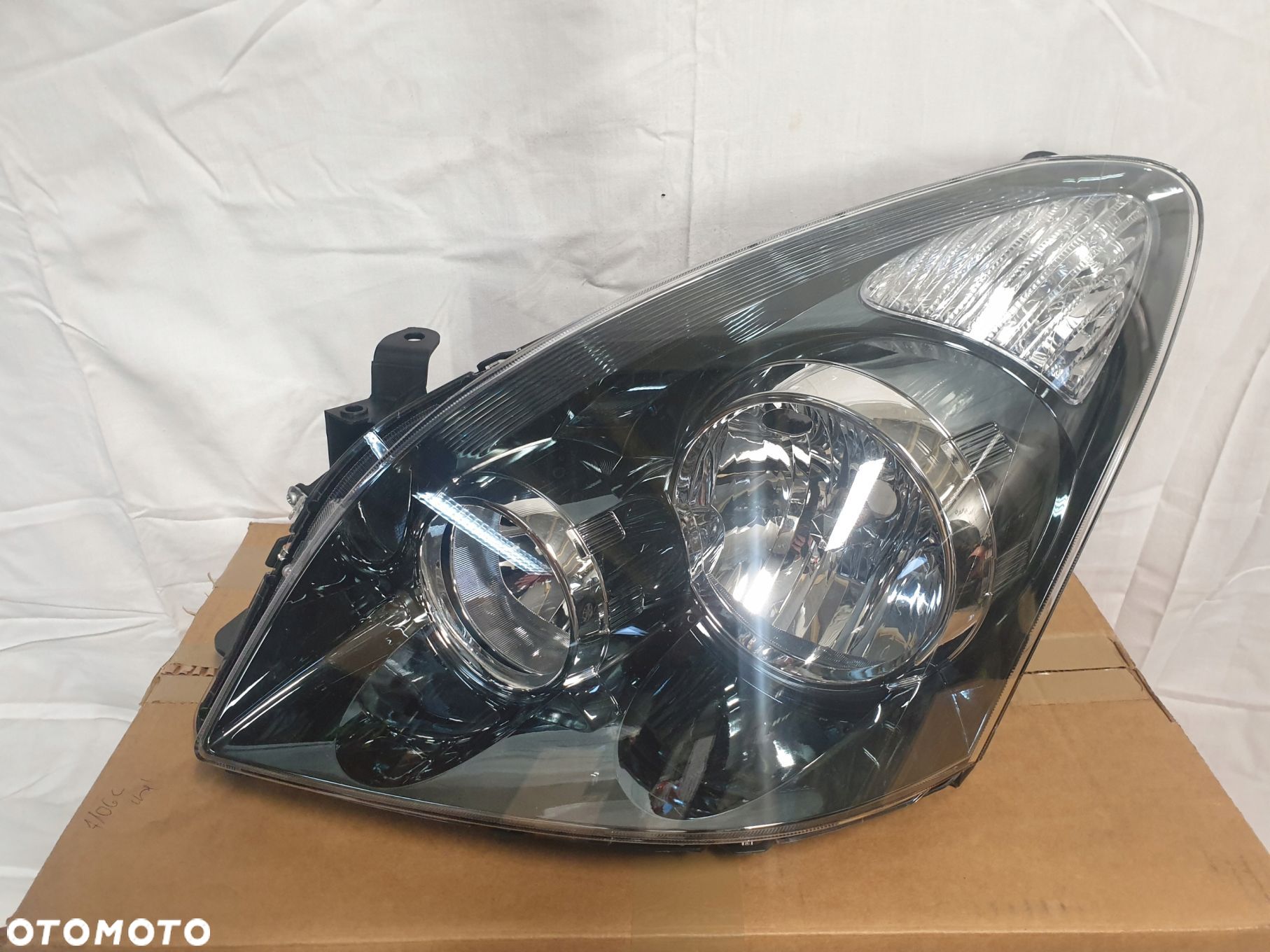 TOYOTA COROLLA VERSO LIFT 06-08 LAMPA LEWA PRZOD - 1