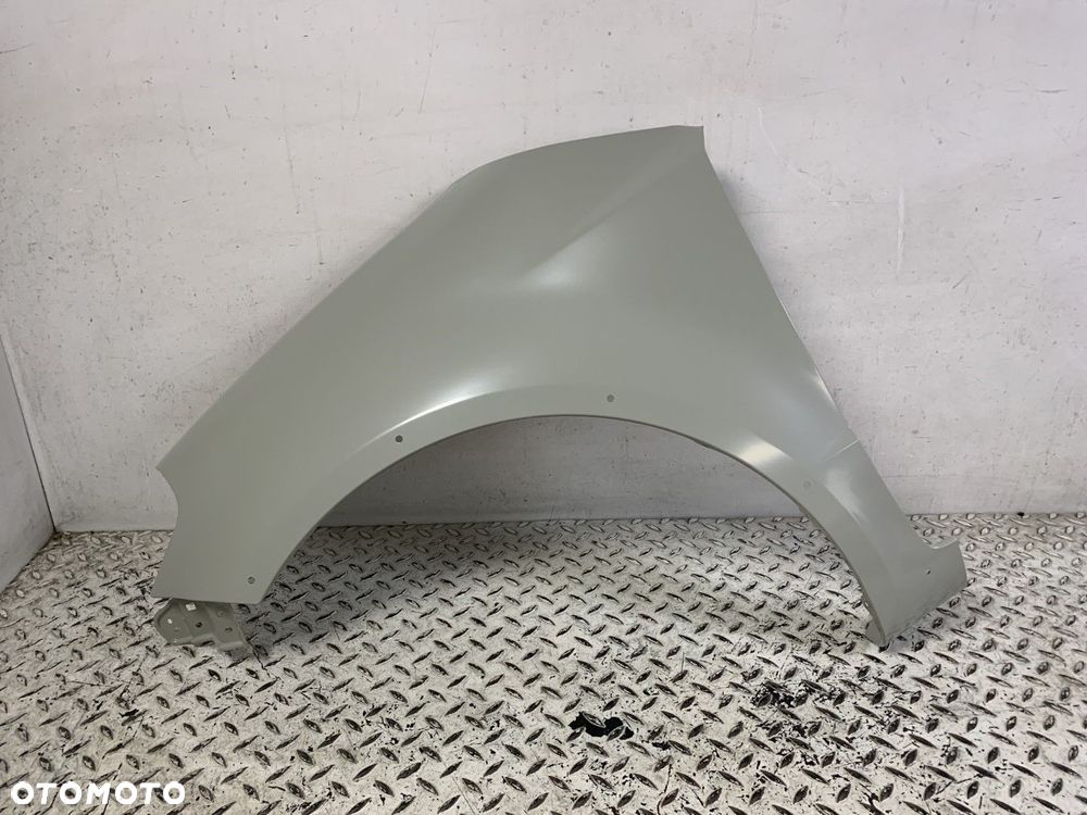 NOWY ORYGINALNY BŁOTNIK LEWA PRZEDNI LEWA PRZÓD SUZUKI SX4 06-13 57711-79J20 - 2