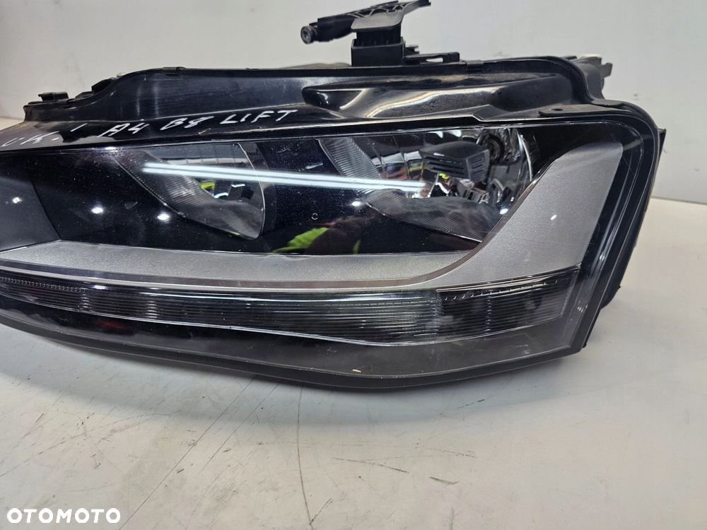 REFLEKTOR LEWY AUDI A4 B8 LIFT UK 8K0941003M - 8