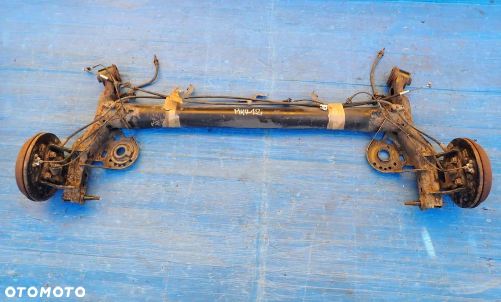 SUZUKI SWIFT MK7 10- BELKA ZAWIESZENIE TYŁ BĘBNY - 1