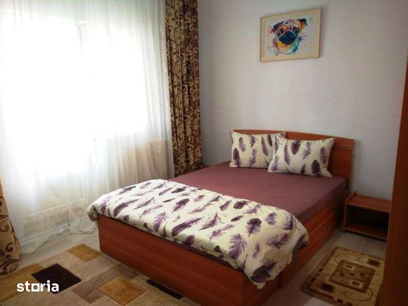 Inchiriez apartament 2 cam. ,confort 1,et. 2/4,decomandat,zona Capitol — fotografia 3