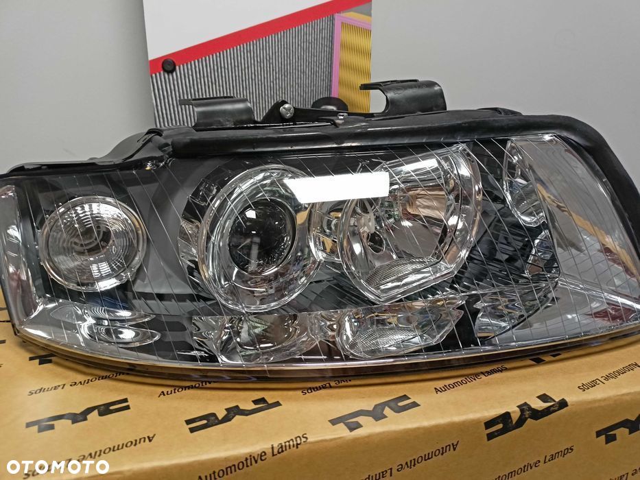 Audi A4 B6 00-04 Lampa/Reflektor prawy /H7+H7 - 7
