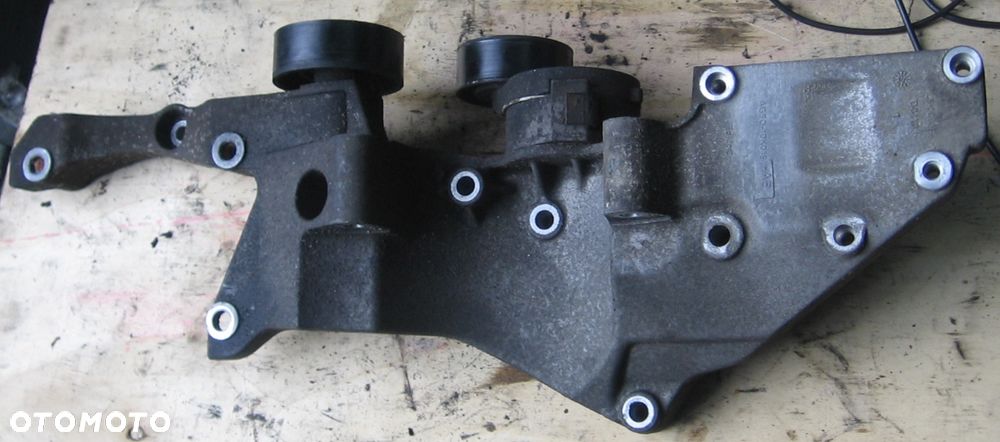 wspornik silnika klimy alternator MONDEO MKIV 2.0 TDCI AG9Q-10K019-AB