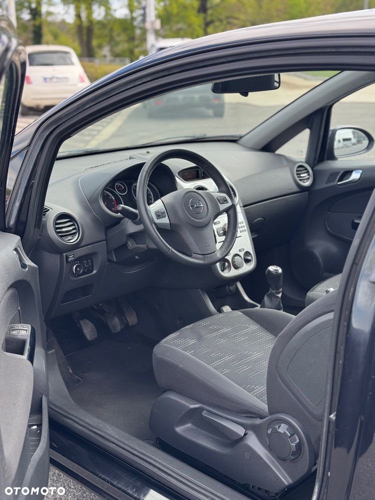 Opel Corsa 1.2 16V Enjoy - 11
